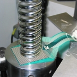 Pressure distribution during coil spring operation